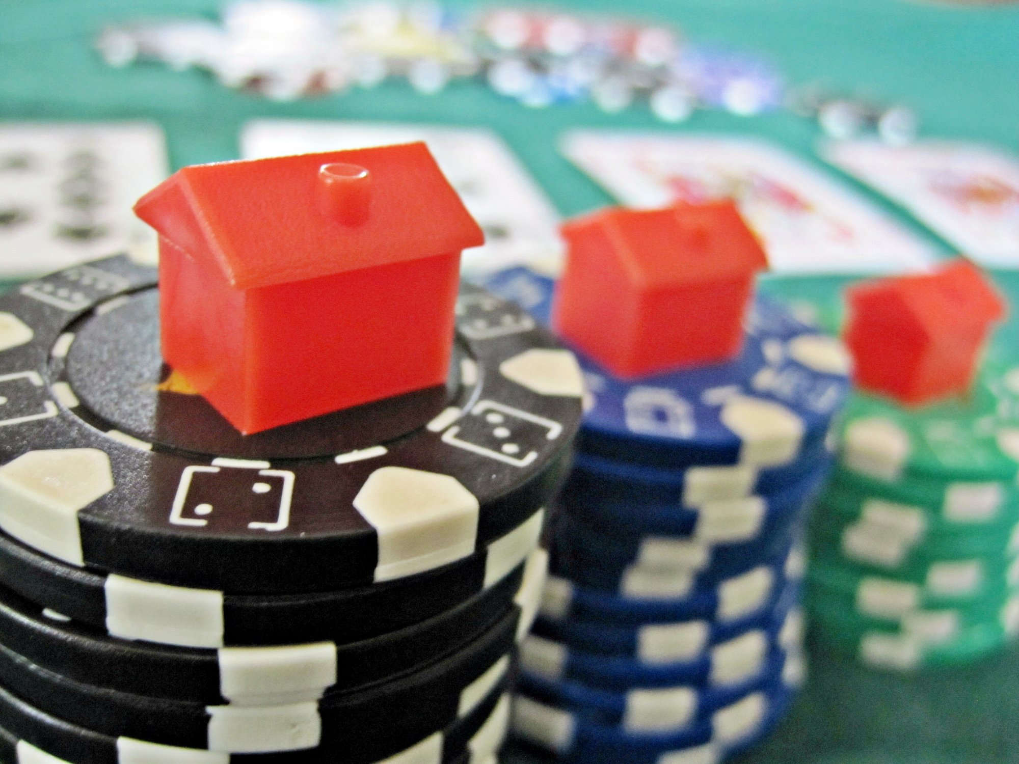 Monopoly houses and poker chips.jpg
