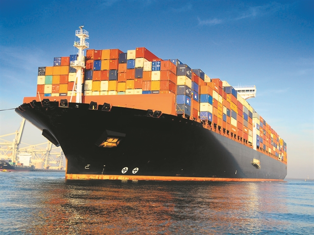 orange black loaded container ship harbour 1.jpg